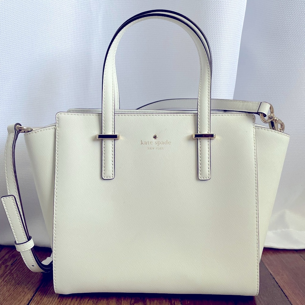 Kate Spade white purse. Worn once and in perfect condition.